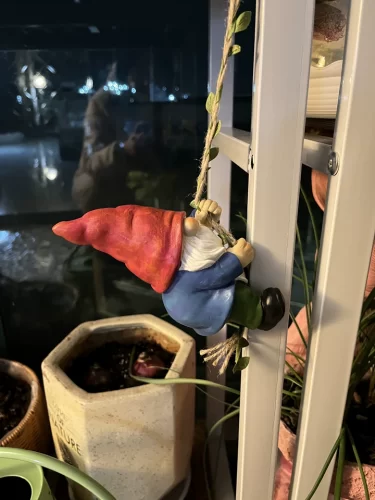 Click to view full screen Runaway Gnome Figurine Climbing on The Wall review-1